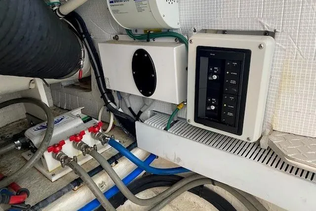 Slide: The Image of Engine room of 2013 Back Cove 34 boat with electrical panel and wiring. - 23