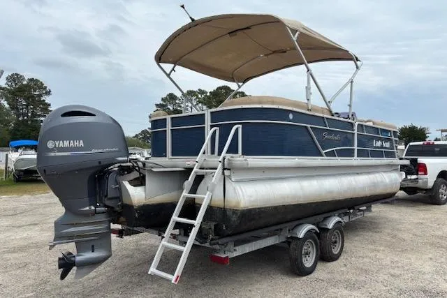 Slide: The Image of 2019 Sweetwater 2286 pontoon boat on trailer with Yamaha outboard motor. - 3