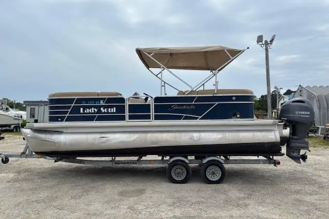 Slide: The Image of 2019 Sweetwater 2286 pontoon boat on trailer with canopy and Yamaha outboard motor. - 6
