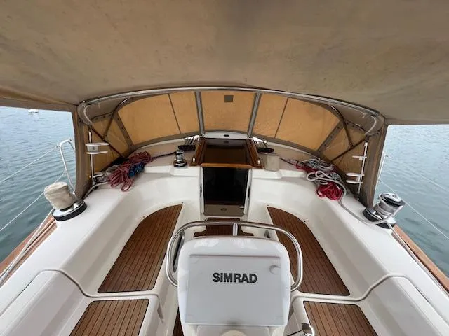 Slide: The Image of Bavaria 42 Cruiser 2000 yacht cockpit with Simrad equipment and wooden deck. - 13