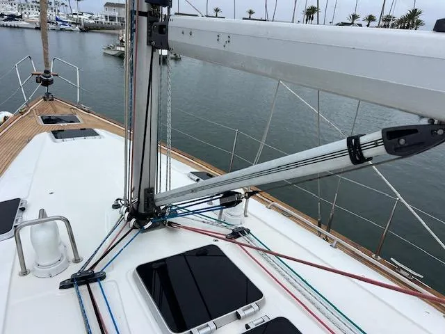 Slide: The Image of Deck view of a 2000 Bavaria 42 Cruiser sailboat in a marina. - 41