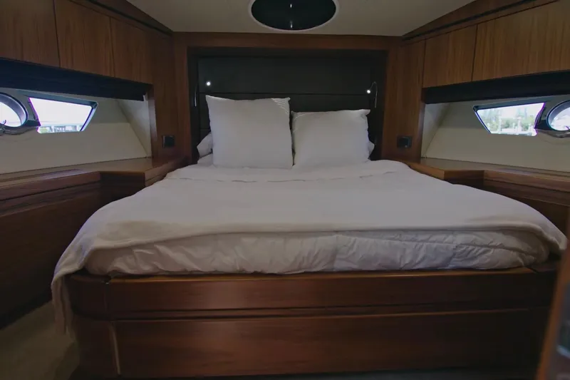 Slide: The Image of Luxurious cabin interior of 2014 Sunseeker Manhattan 55 yacht with cozy bed. - 11