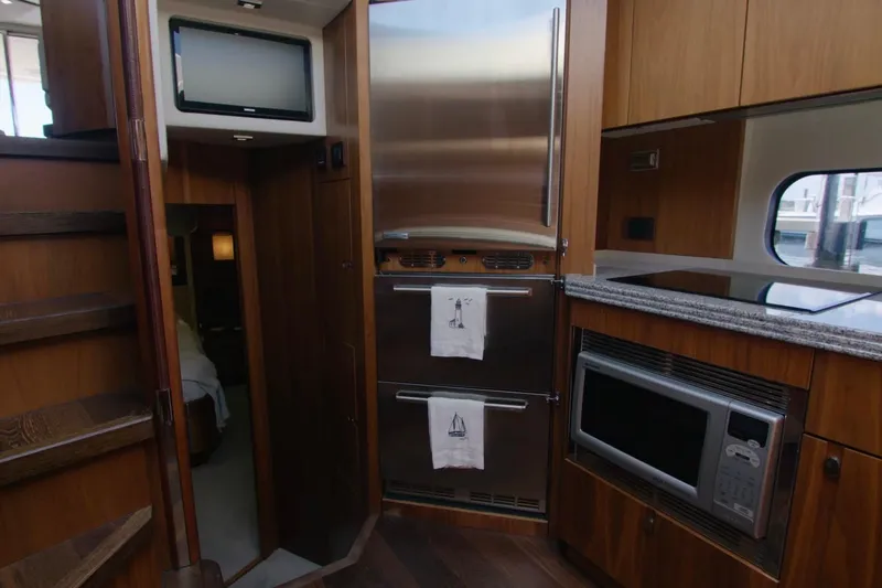 Slide: The Image of Luxurious kitchen interior of 2014 Sunseeker Manhattan 55 yacht with modern appliances. - 16