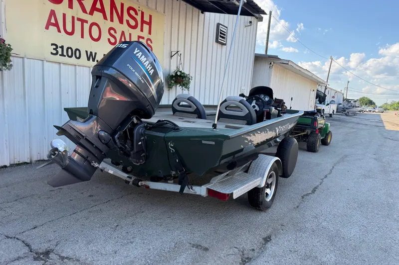 Slide: The Image of 2014 Xpress H18 boat with Yamaha motor on trailer at dealership. - 1
