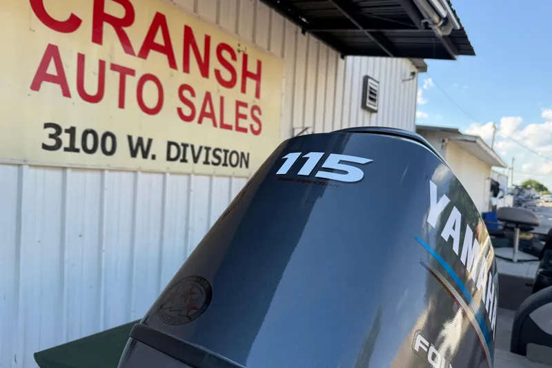 Slide: The Image of Outboard motor at Cransh Auto Sales, featuring Yamaha 115, Xpress H18, 2014 model. - 12