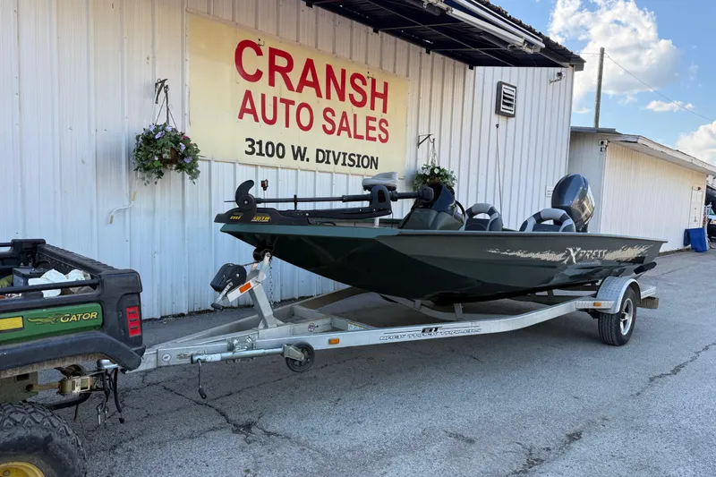 Slide: The Image of 2014 Xpress H18 boat on trailer at Cransh Auto Sales, 3100 W. Division. - 17