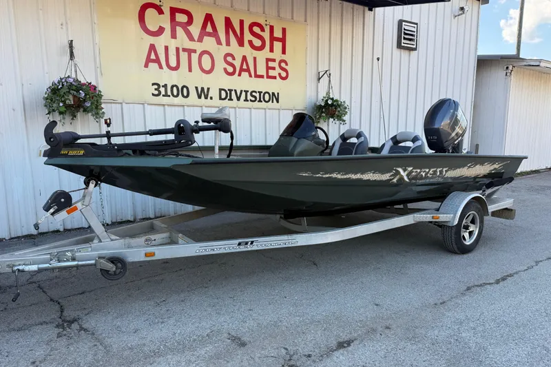 Slide: The Image of 2014 Xpress H18 boat on trailer at Cransh Auto Sales, 3100 W. Division. - 2