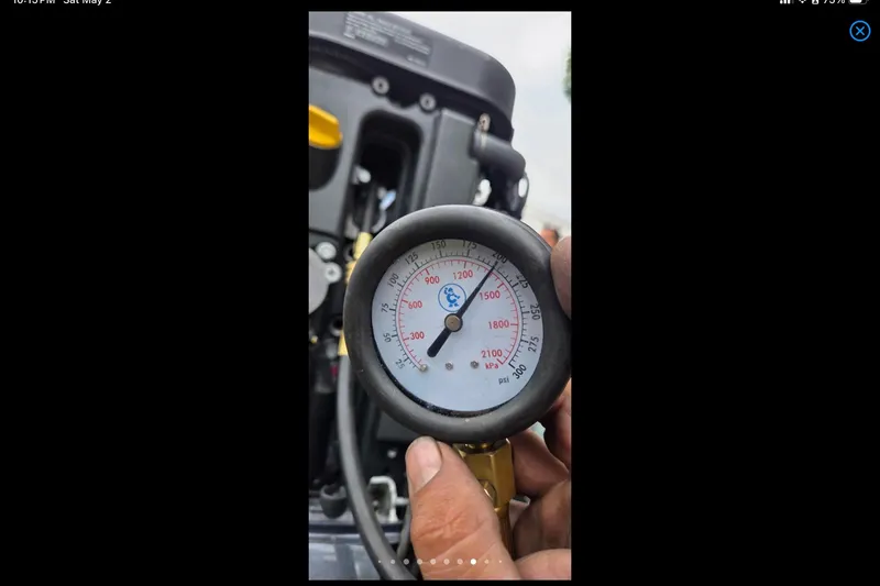 Slide: The Image of Close-up of a pressure gauge reading 1500 psi on Xpress H18, 2014 model. - 22
