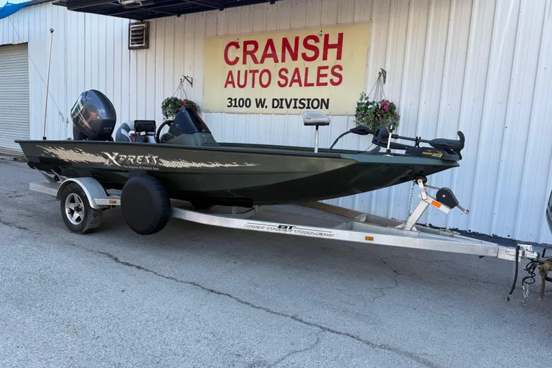 Slide: The Image of 2014 Xpress H18 boat on trailer at Cransh Auto Sales. - 8