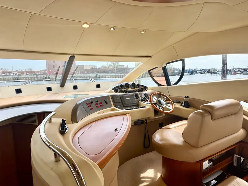 Slide: The Image of Interior of a 2009 Azimut 50 yacht, luxurious cockpit design. - 22
