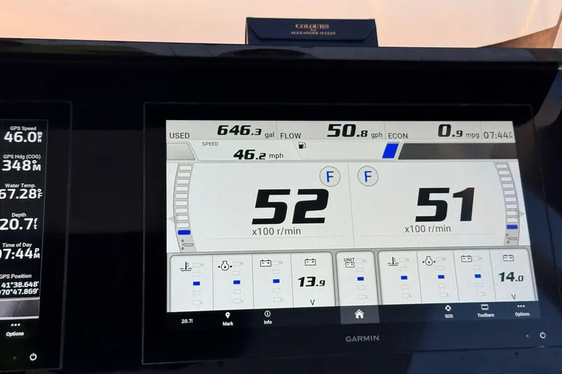 Slide: The Image of Garmin marine display showing Edgewater 262CC 2022 boat metrics: speed, fuel, and engine RPM. - 14
