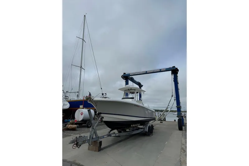 Slide: The Image of 2022 Edgewater 262CC boat on trailer at Mattapoisett Boatyard, ready for launch. - 6