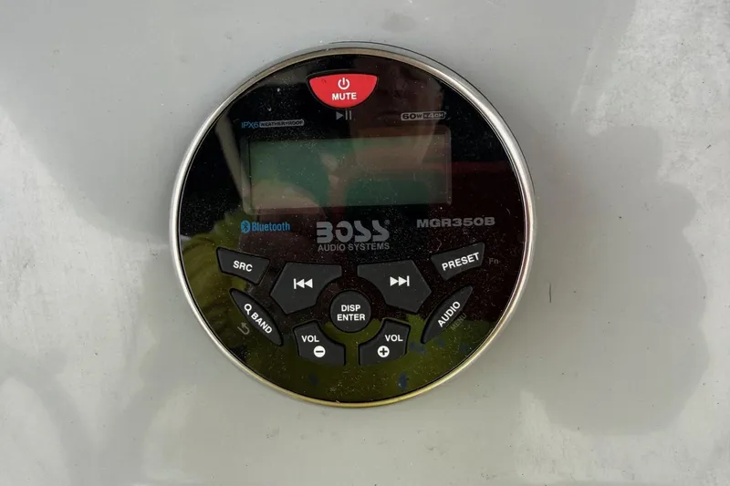 Slide: The Image of BOSS Audio Systems MGR350B control panel on 2022 Bayliner Trophy T22CX boat. - 5