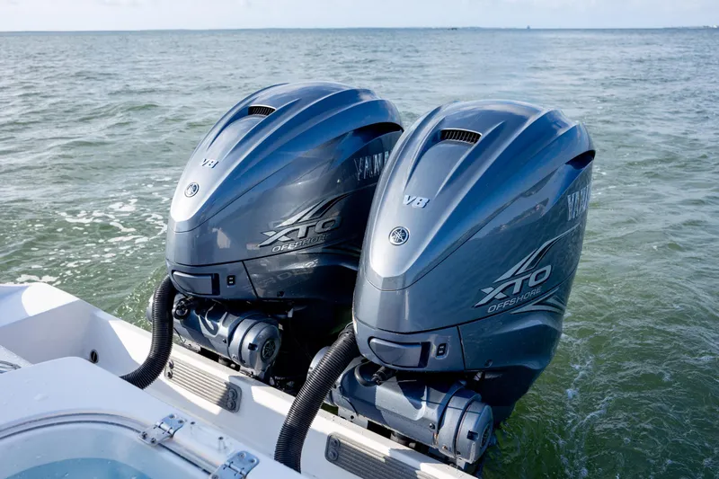 Slide: The Image of Twin Yamaha XTO Offshore V8 engines on a 2020 Cobia 350 Center Console boat. - 10