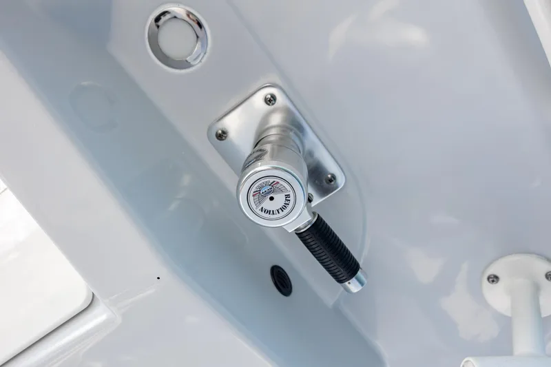 Slide: The Image of 2020 Cobia 350 Center Console boat detail, featuring a mounted handle and control panel. - 28