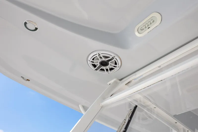 Slide: The Image of 2020 Cobia 350 Center Console boat ceiling with speaker and light fixtures. - 40