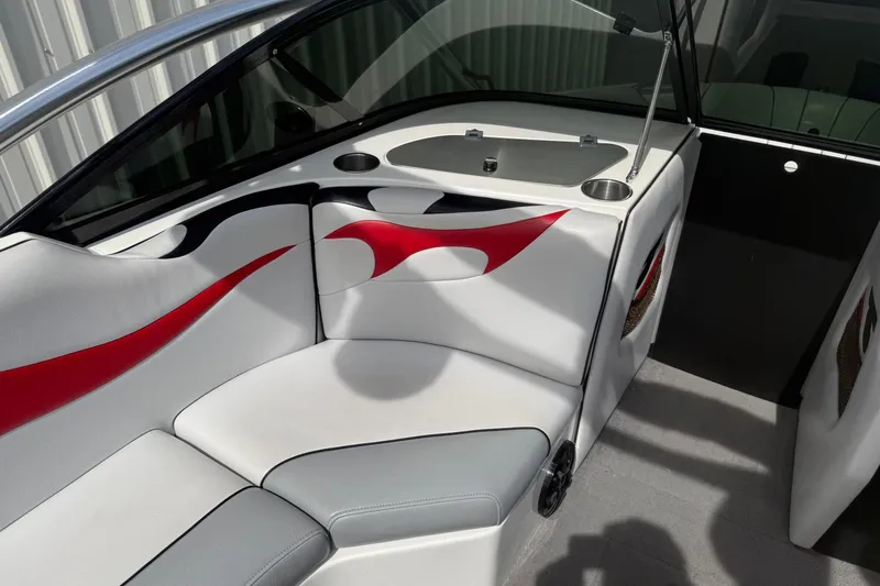 Slide: The Image of Interior of 2006 MB SPORTS B52 boat with white and red seating. - 10