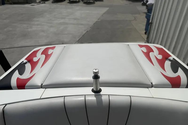 Slide: The Image of 2006 MB SPORTS B52 boat interior with red and white upholstery design. - 14