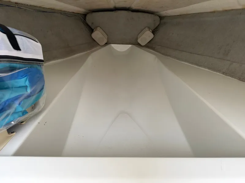 Slide: The Image of Interior of a 2003 Baja 20 Outlaw boat. - 13