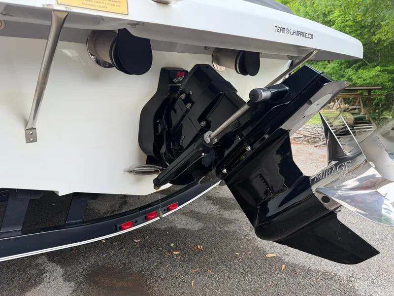 Slide: The Image of Rear view of a 2003 Baja 20 Outlaw boat with Mirage propeller. - 9