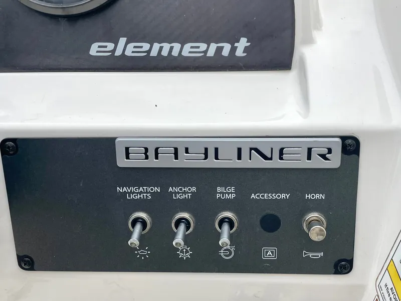Slide: The Image of Control panel of a 2017 Bayliner E21 boat. - 15