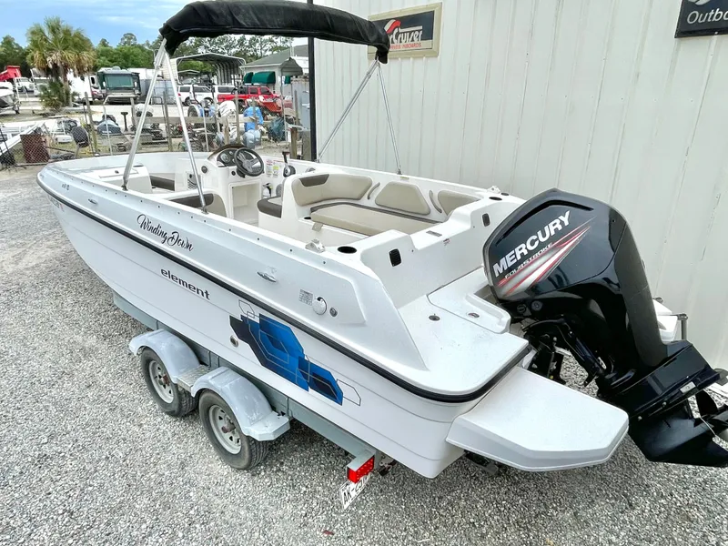 Slide: The Image of 2017 Bayliner E21 boat with Mercury outboard motor. - 16