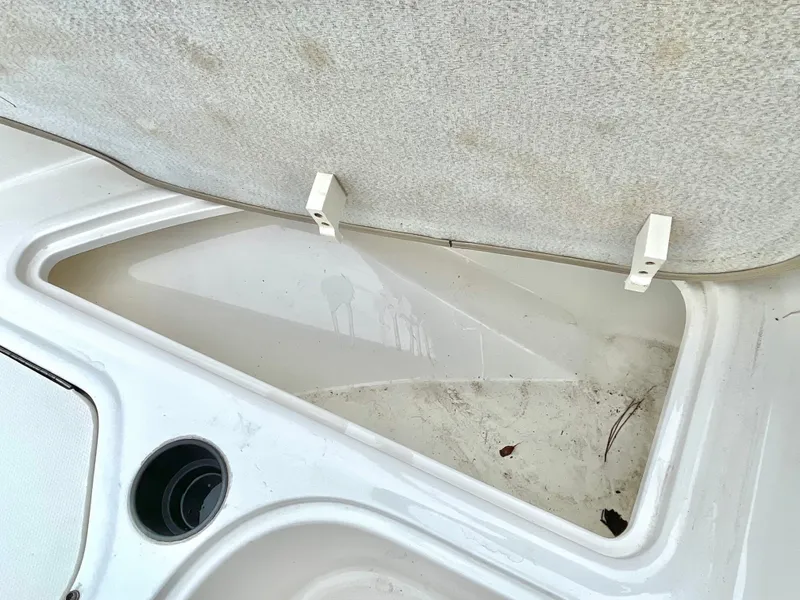 Slide: The Image of Storage compartment in 2017 Bayliner E21 boat. - 21