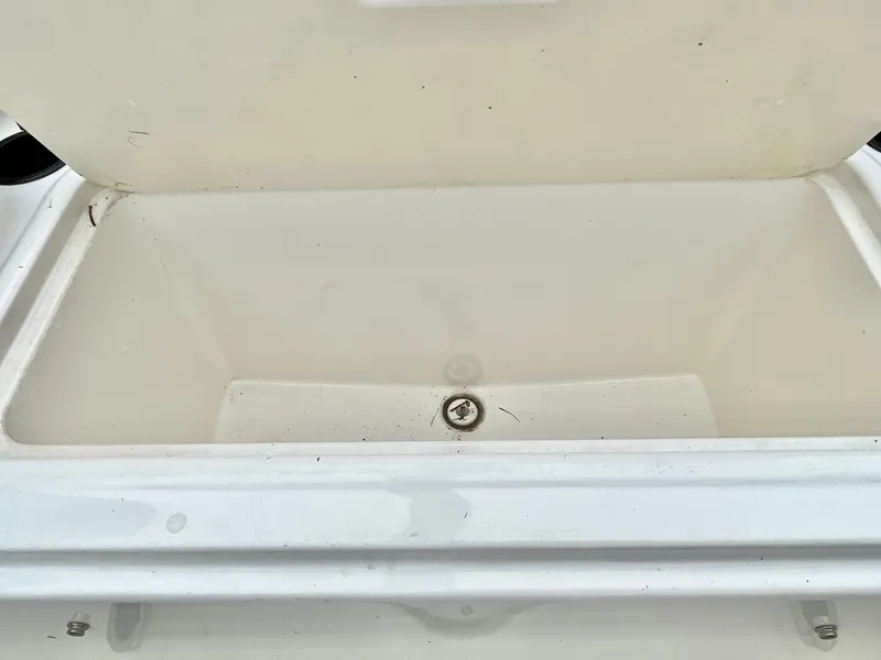 Slide: The Image of Open storage compartment in 2017 Bayliner E21 boat. - 26