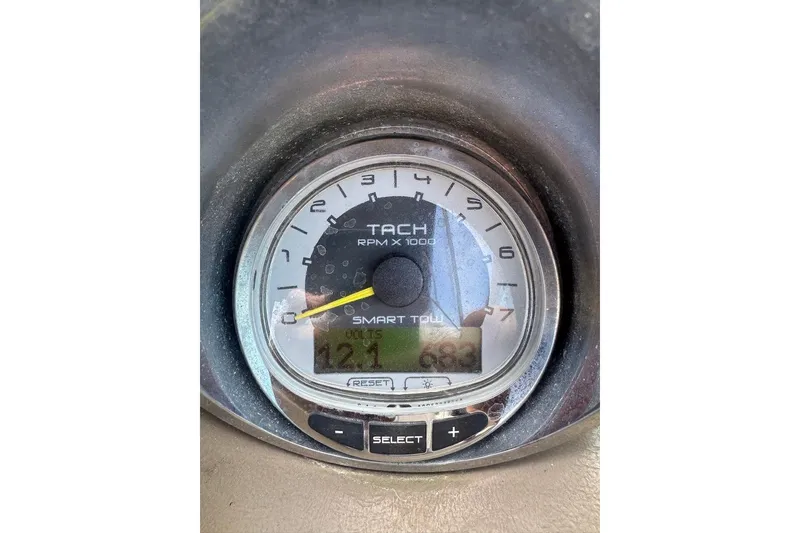 Slide: The Image of Tachometer of 2013 Sea Ray 280 Sundeck displaying RPM and voltage readings. - 14