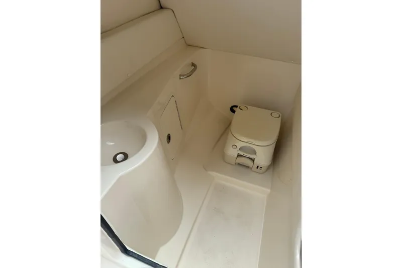 Slide: The Image of Interior of 2013 Sea Ray 280 Sundeck boat bathroom with sink and toilet. - 38