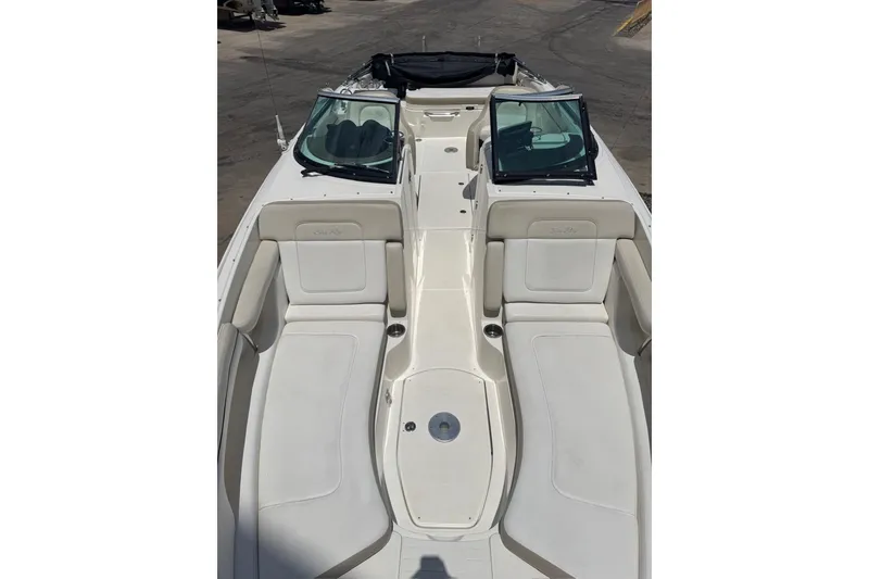Slide: The Image of 2013 Sea Ray 280 Sundeck boat with spacious seating and sleek design. - 4