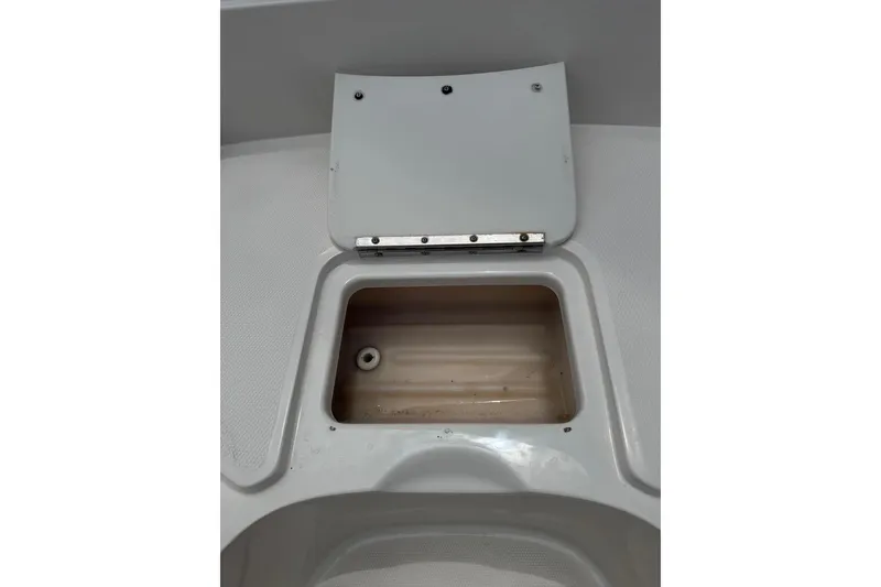 Slide: The Image of Open storage compartment on 2013 Sea Ray 280 Sundeck boat. - 40