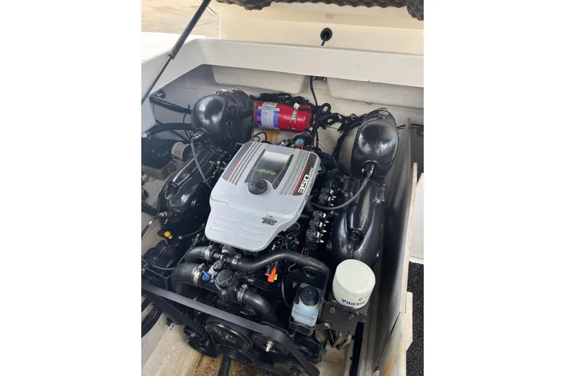 Slide: The Image of Engine compartment of a 2013 Sea Ray 280 Sundeck boat. - 43
