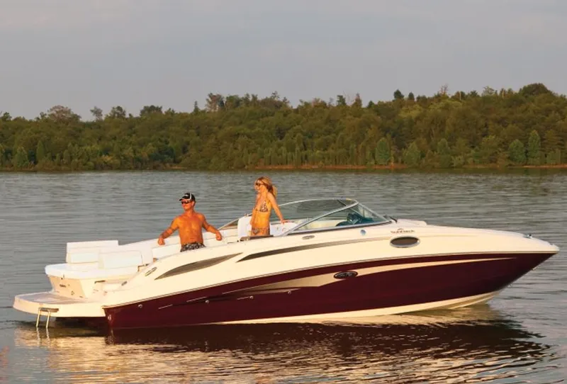 Slide: The Image of Manufacturer Provided Image: 2013 Sea Ray 280 Sundeck boat on a calm lake with two people onboard. - 50
