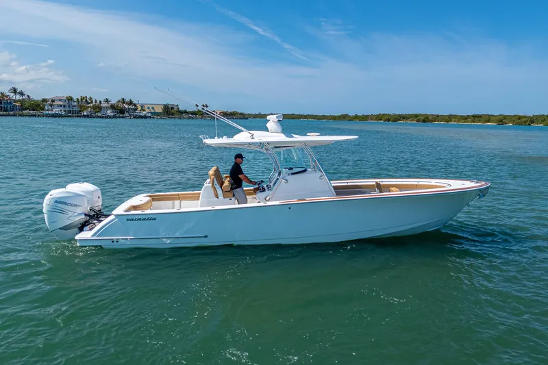 Slide: The Image of 2022 Valhalla Boatworks V-33 cruising on a sunny day in calm waters. - 22