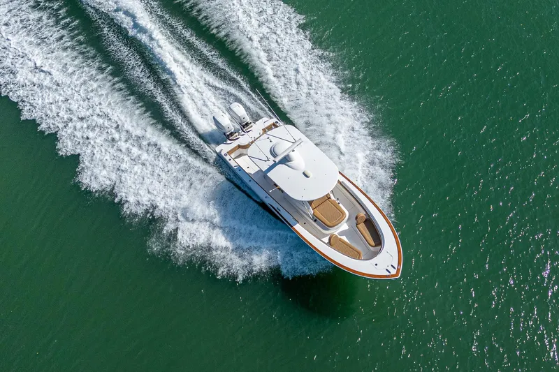 Slide: The Image of Aerial view of 2022 Valhalla Boatworks V-33 cruising on open water. - 32