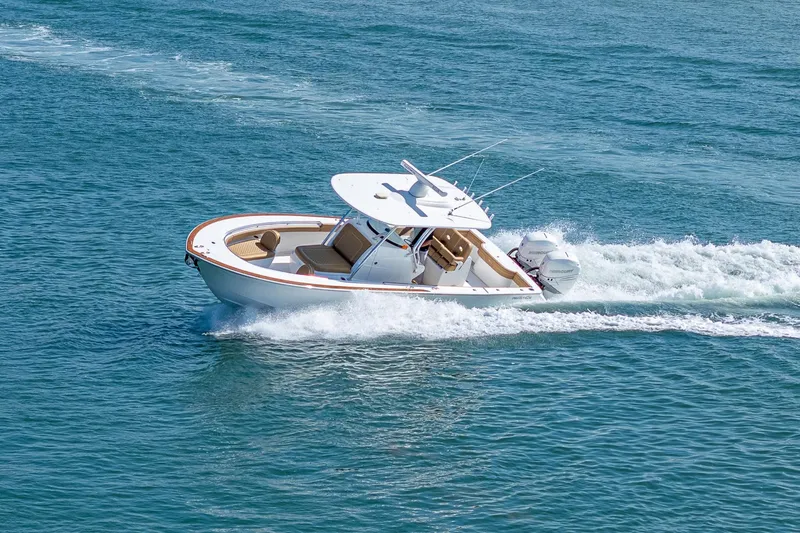 Slide: The Image of 2022 Valhalla Boatworks V-33 cruising on open water, showcasing sleek design and performance. - 34