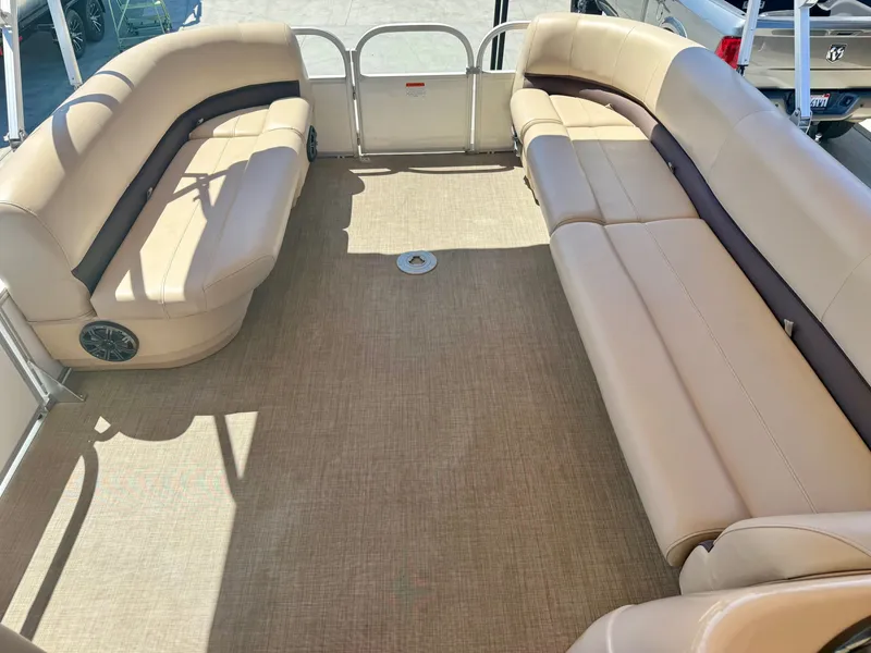 Slide: The Image of Interior of 2017 Sun Tracker PARTY BARGE 24 DLX XP3 with beige seating. - 16