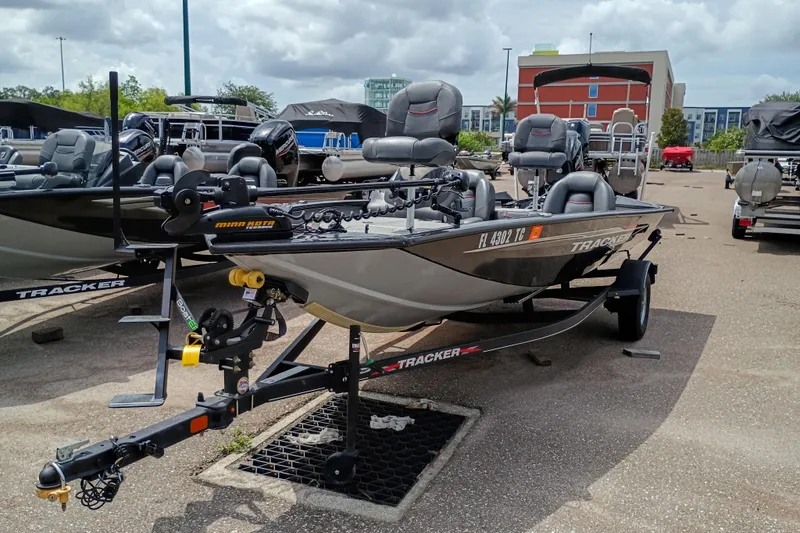 The Image of 2022 Tracker Pro Team 175 TXW fishing boat on trailer in outdoor lot. - 42