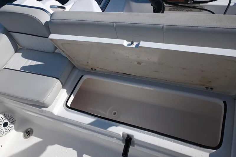 Slide: The Image of Open storage compartment on a 2020 Sea Fox 249 Avenger boat. - 26