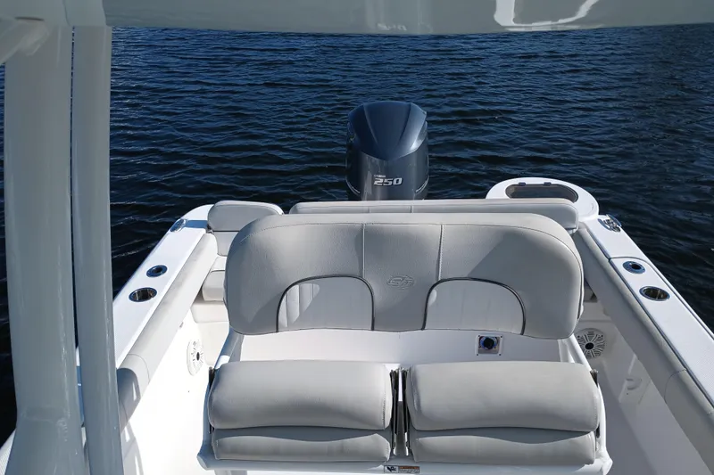 Slide: The Image of 2020 Sea Fox 249 Avenger boat interior with cushioned seating and Yamaha 250 engine. - 28
