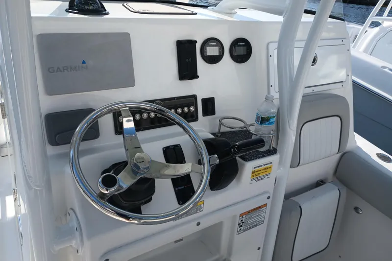Slide: The Image of Steering console of 2020 Sea Fox 249 Avenger boat with Garmin navigation system. - 30