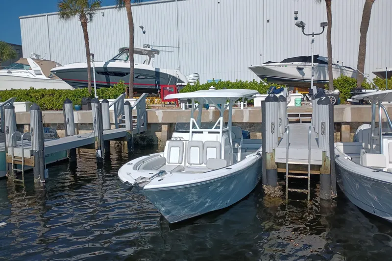 Slide: The Image of 2020 Sea Fox 249 Avenger docked at marina with other boats. - 41