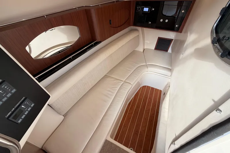 Slide: The Image of Luxurious seating area on a 2018 Grady-White Freedom 335 boat, featuring a stylish table. - 40