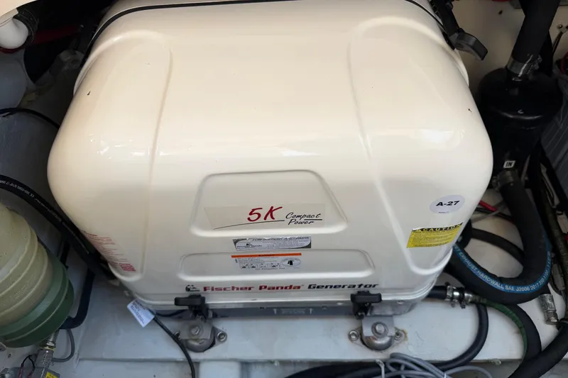 Slide: The Image of Fischer Panda generator in 2018 Grady-White Freedom 335 boat engine compartment. - 53