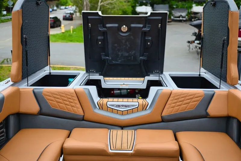 Slide: The Image of Interior of 2022 Nautique Super Air Nautique G23 with luxurious seating. - 22