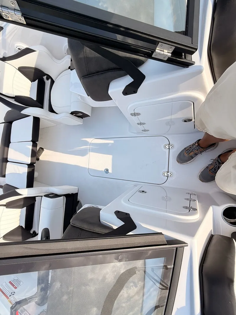 Slide: The Image of Interior of 2026 Stingray 20 SBX boat with modern seating. - 20