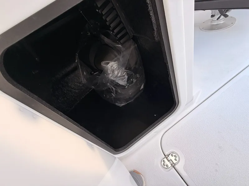 Slide: The Image of Stingray 20 SBX 2026 boat compartment with storage space. - 21
