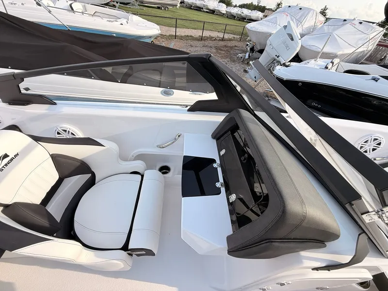 Slide: The Image of Interior of 2026 Stingray 20 SBX boat with luxurious seating. - 25