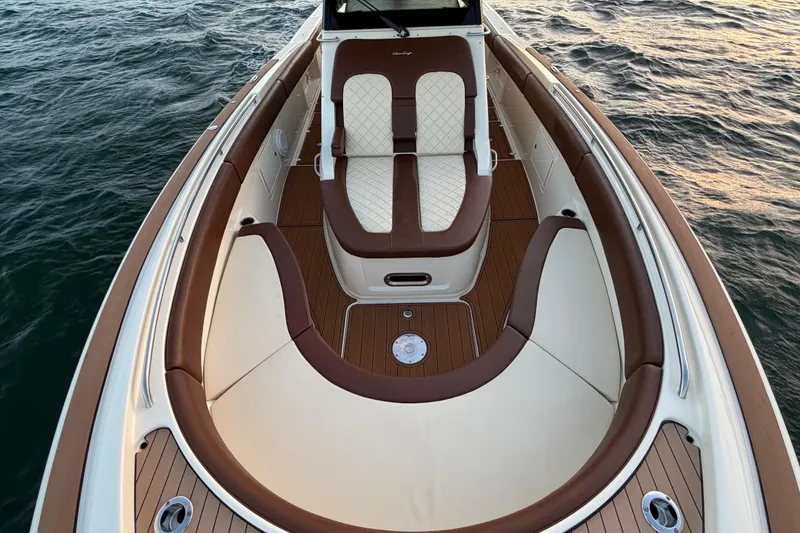 Slide: The Image of 2021 Chris-Craft Catalina 34 boat interior with elegant seating and wood finish. - 30